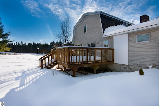 view of snow covered deck