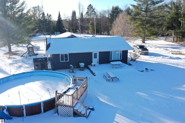 view of snow covered property