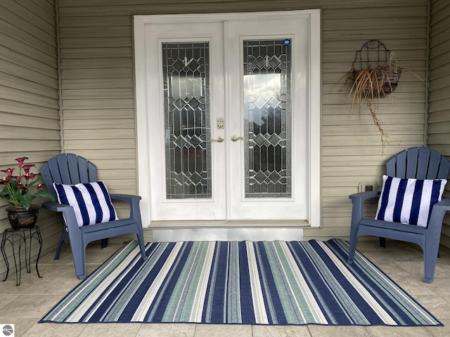 entrance to property featuring french doors