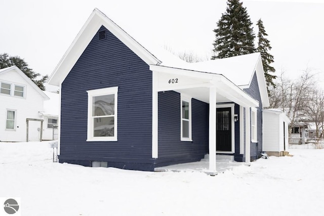 view of snow covered property