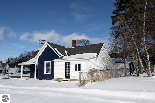 view of snow covered property