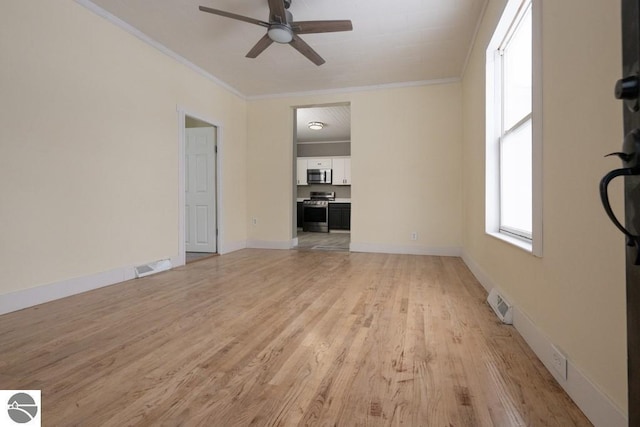 unfurnished living room featuring crown molding, ceiling fan, and light hardwood / wood-style floors