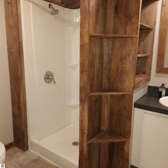 bathroom featuring vanity and walk in shower