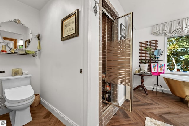 bathroom featuring parquet floors, a shower, and toilet