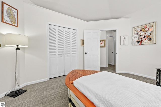 bedroom featuring a closet and carpet