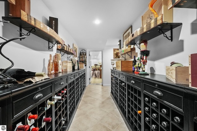 wine cellar with light tile patterned floors