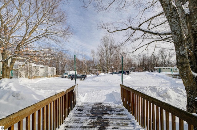 view of yard covered in snow