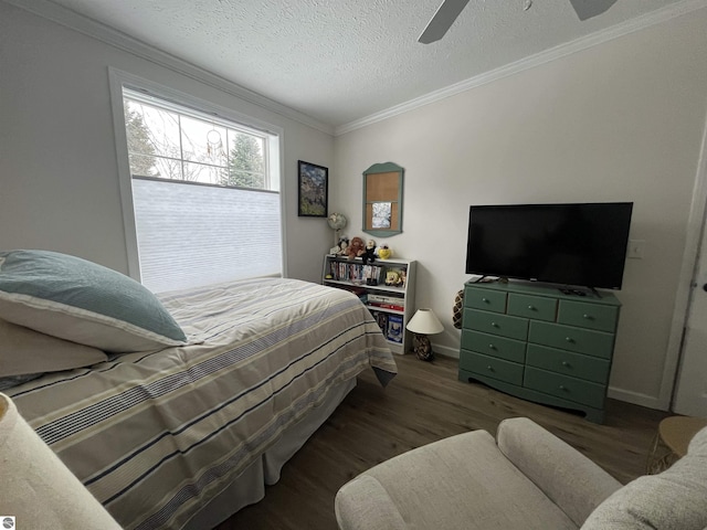 bedroom featuring dark hardwood / wood-style flooring, ceiling fan, ornamental molding, and a textured ceiling