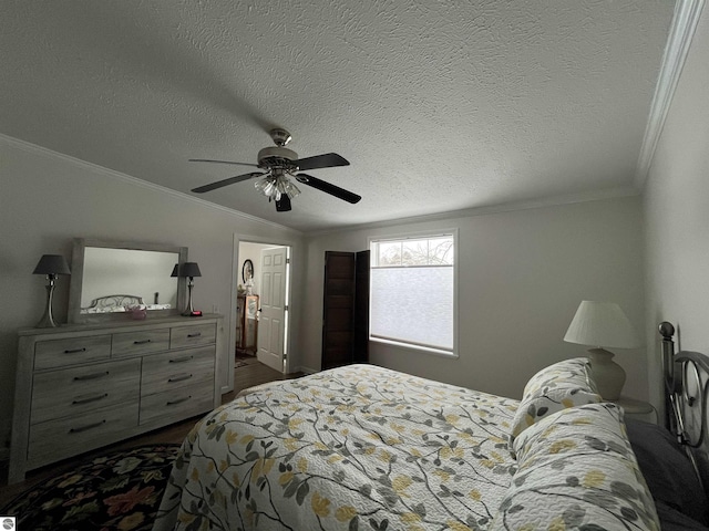 bedroom with ornamental molding, vaulted ceiling, a textured ceiling, and ceiling fan