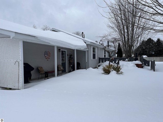 view of yard covered in snow