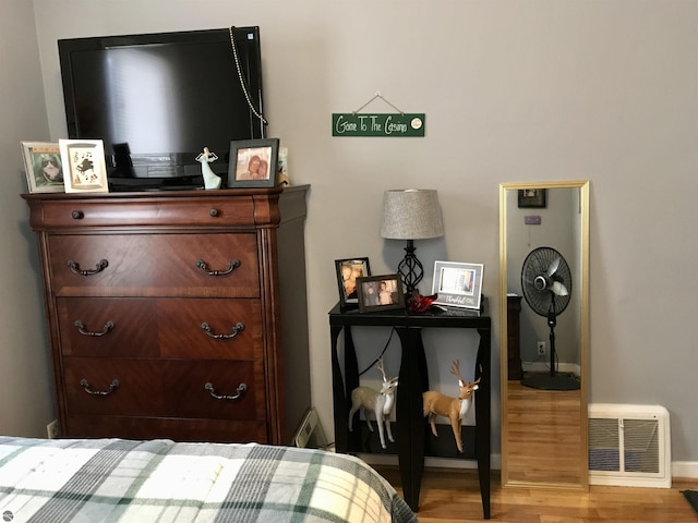 bedroom with light wood-type flooring