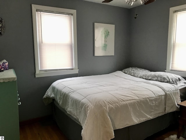 bedroom featuring dark wood-type flooring