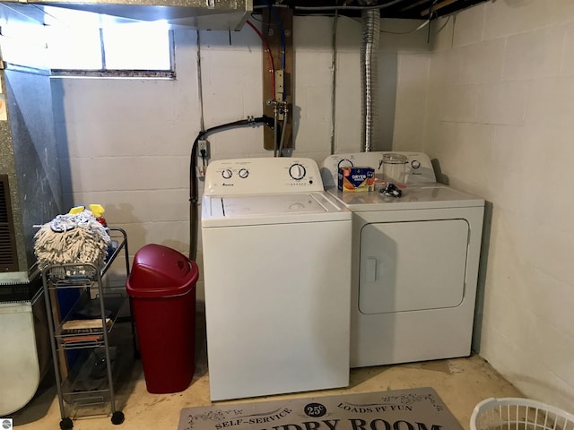 washroom with separate washer and dryer