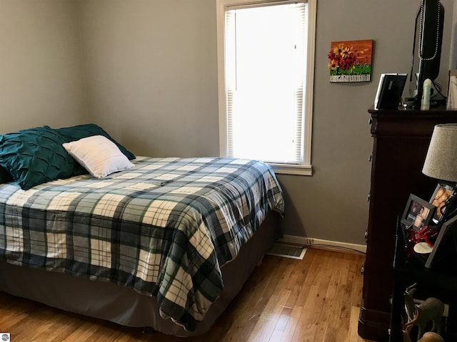 bedroom featuring light hardwood / wood-style flooring