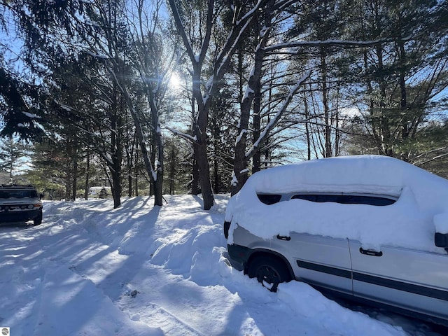 view of yard layered in snow