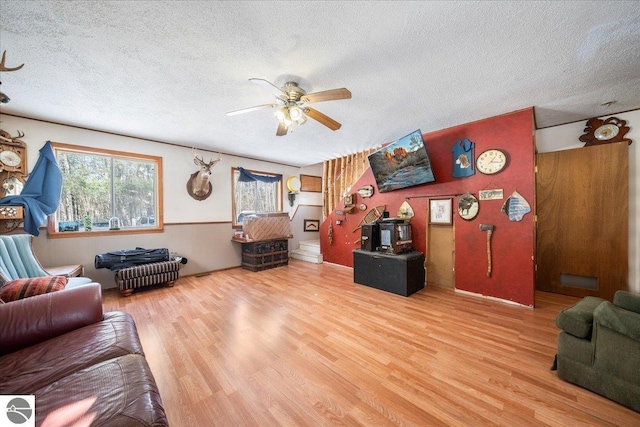 living room featuring hardwood / wood-style floors and a textured ceiling