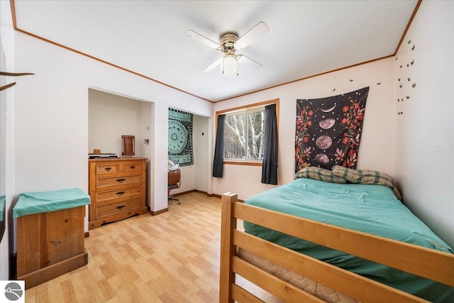 bedroom featuring ceiling fan and light wood-type flooring