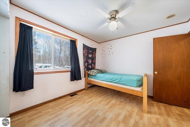 unfurnished bedroom featuring hardwood / wood-style flooring and ceiling fan