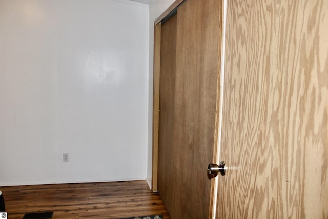 hall featuring dark hardwood / wood-style flooring