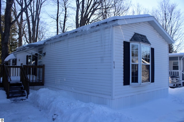 view of snow covered property