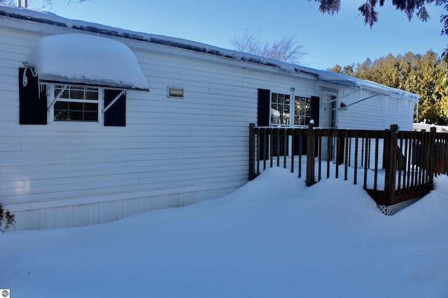 exterior space with a wooden deck