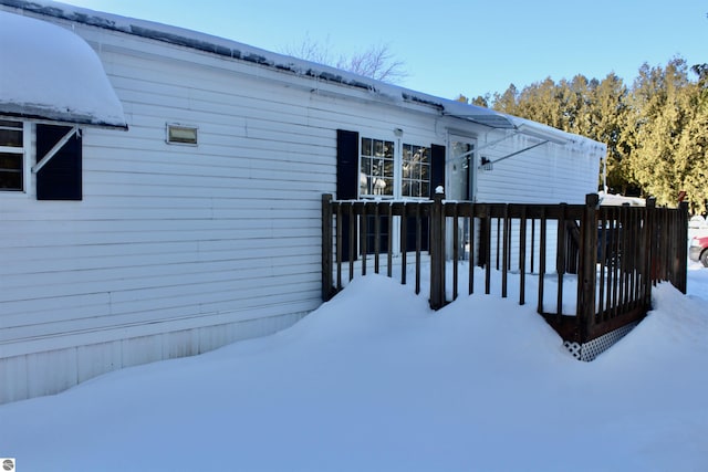 view of snow covered deck