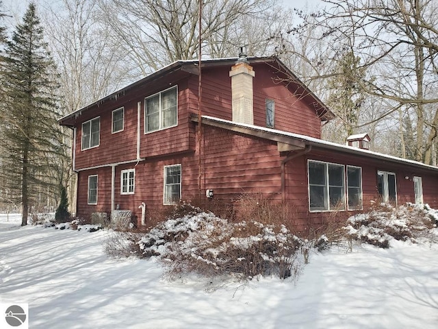 view of snow covered property