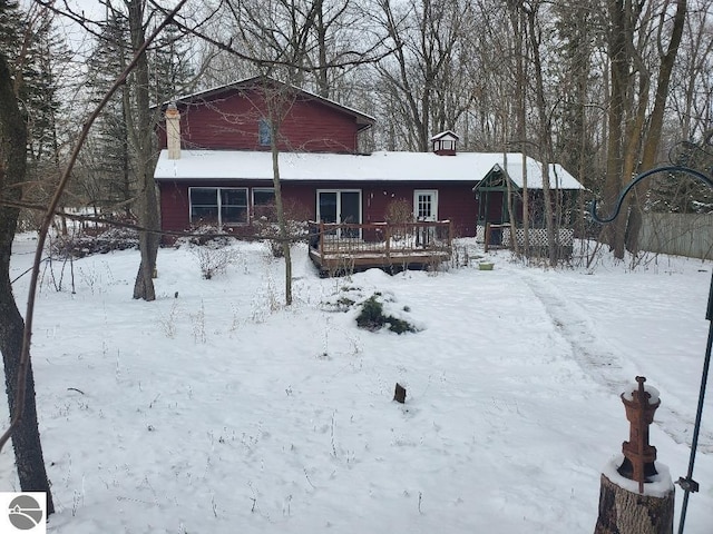 view of front of house with a wooden deck