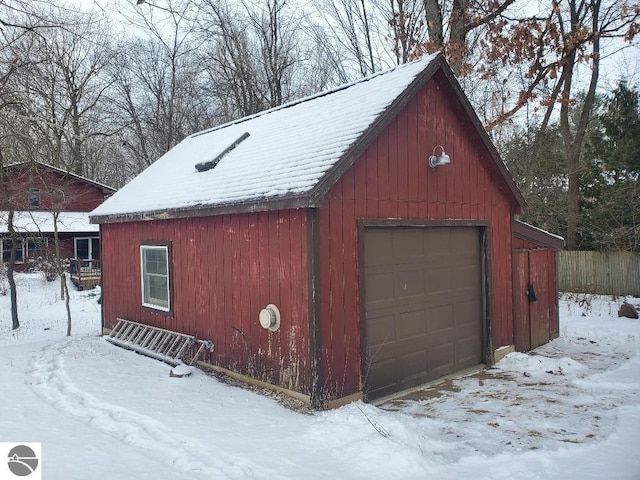 view of snow covered garage