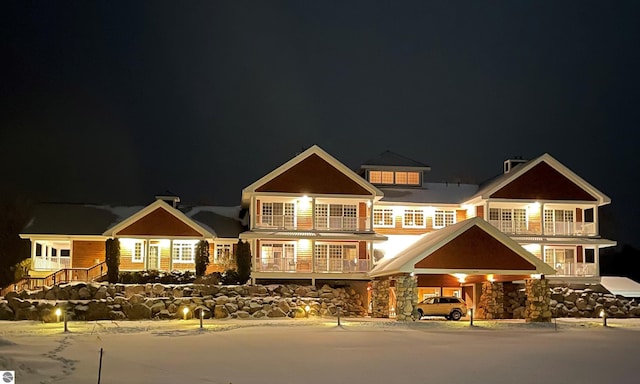 craftsman-style home featuring a carport