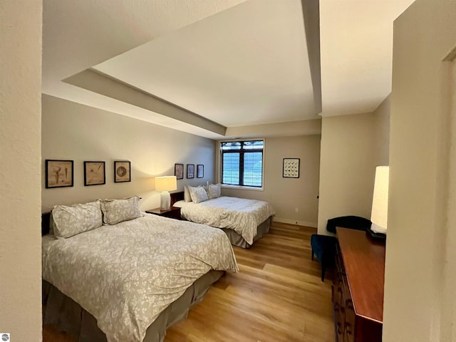 bedroom featuring light wood-type flooring