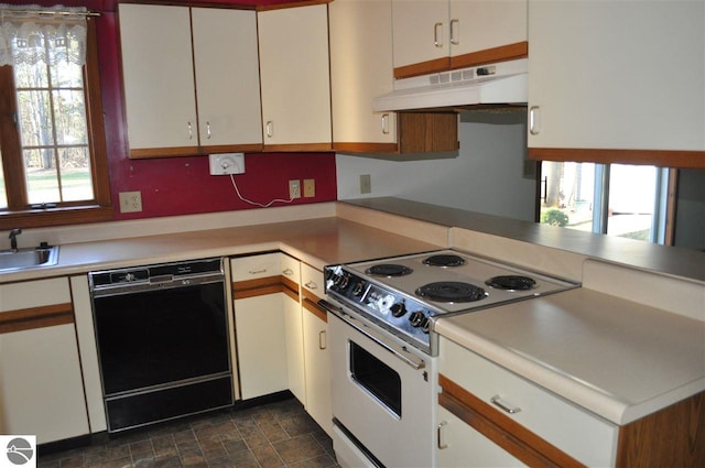 kitchen featuring black dishwasher, light countertops, white range with electric cooktop, and under cabinet range hood