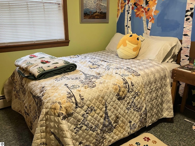 bedroom featuring dark colored carpet