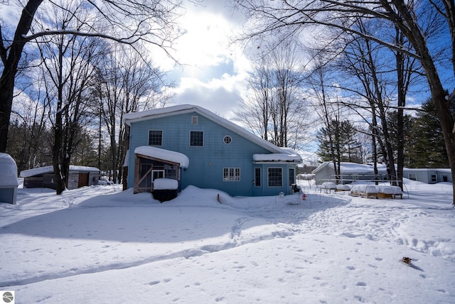 view of snow covered property