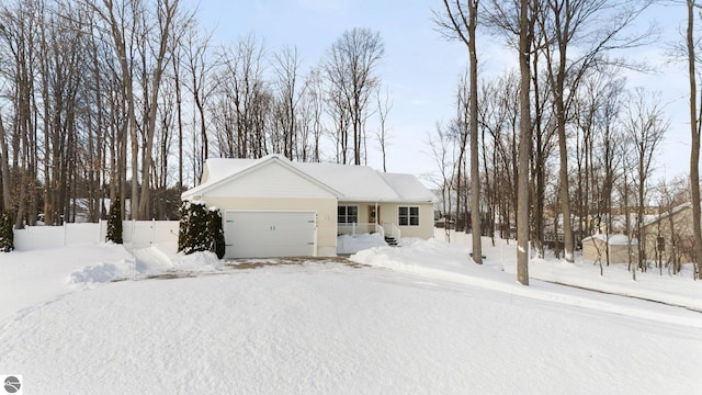 view of front of property featuring a garage