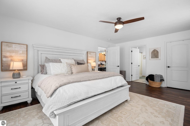 bedroom featuring hardwood / wood-style flooring and ceiling fan