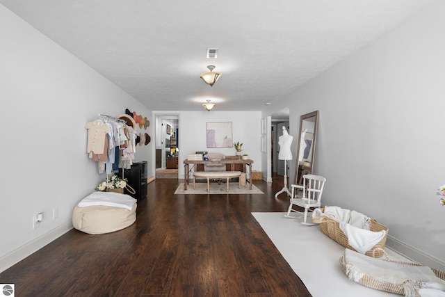 interior space with dark hardwood / wood-style flooring