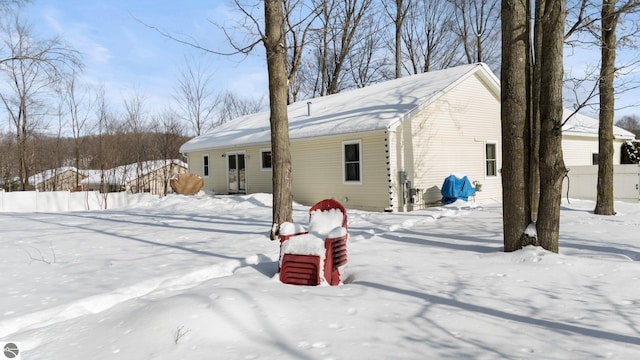 view of snow covered house