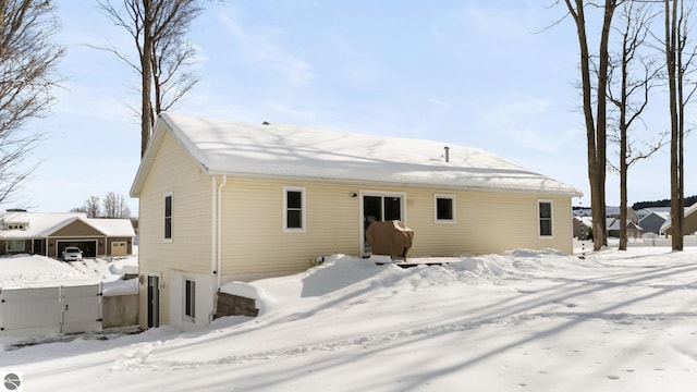 view of snow covered property