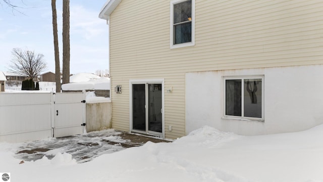 view of snow covered property