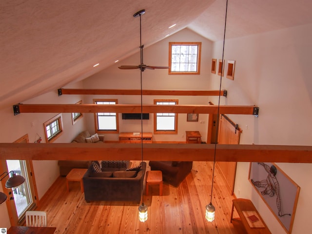 interior space featuring hardwood / wood-style flooring and ceiling fan