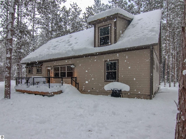 view of snow covered house