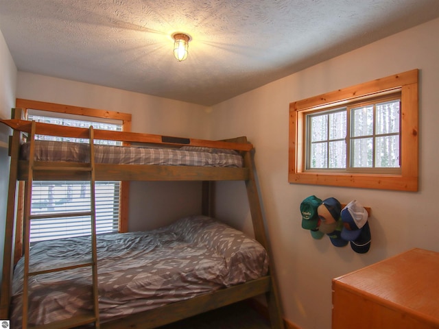 bedroom featuring a textured ceiling