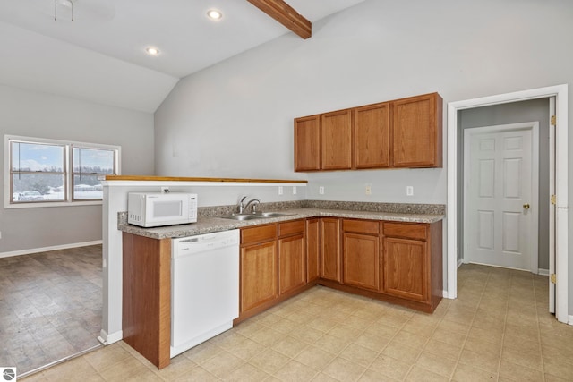 kitchen featuring sink, white appliances, and vaulted ceiling with beams