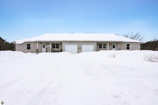 ranch-style home with a garage