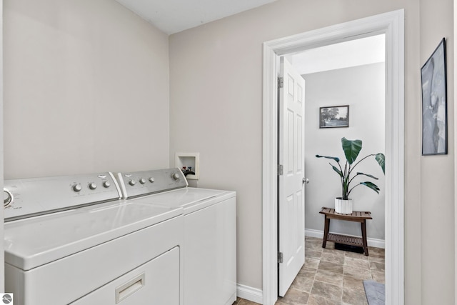 clothes washing area featuring independent washer and dryer