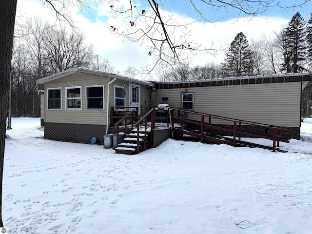 view of snow covered property