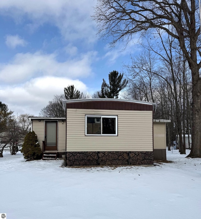 view of snow covered property