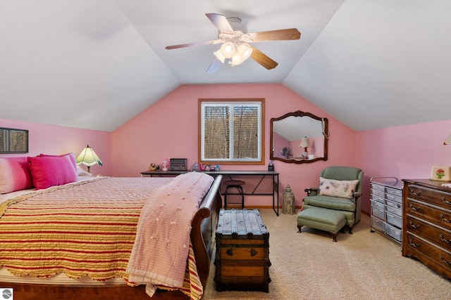 carpeted bedroom featuring lofted ceiling and ceiling fan