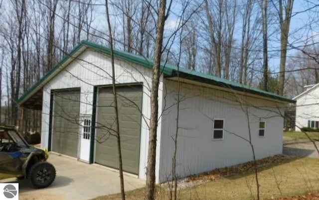 view of outdoor structure with a garage